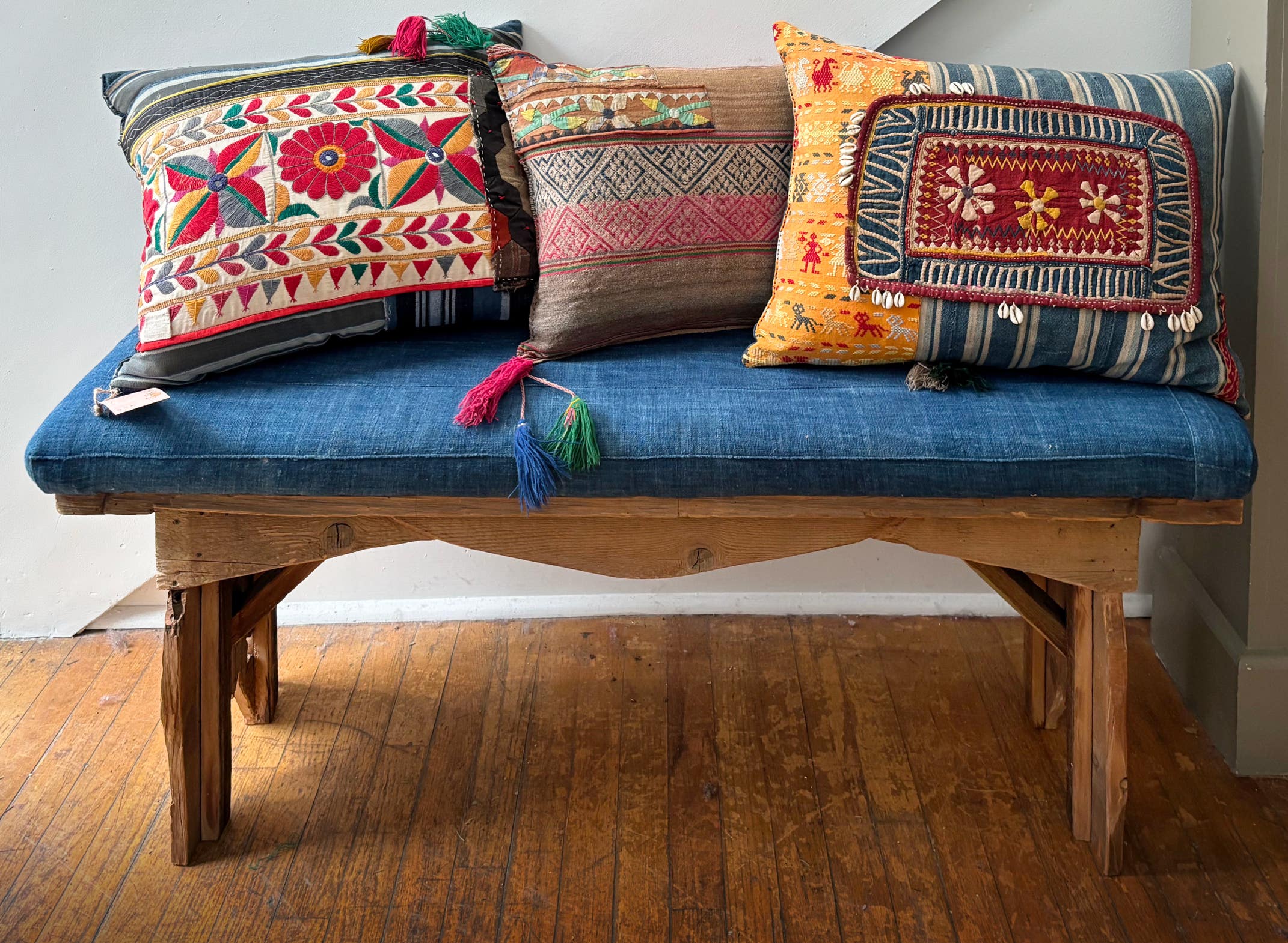 We add storied fabric to chairs, sofas, pillows & occasionally apparel.